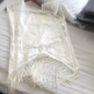 Cut out top with fringe design